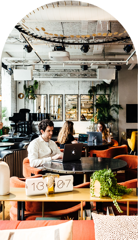 Kindred coworking space in Hammersmith with seating, plants and natural light