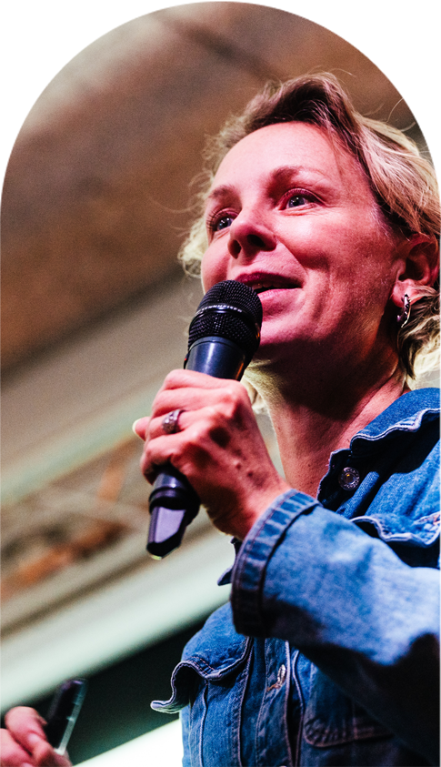 Speaker on stage during a conference at Kindred, Bradmore House