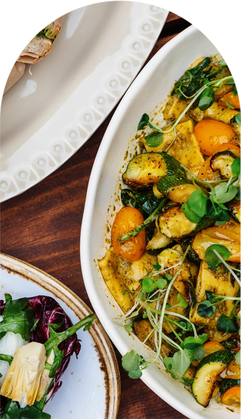 A spread of fresh, seasonal dishes and sandwiches prepared by Kindred Catering